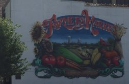 building mural with vegetables and words farmers market