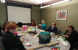 DSCC's Springfield Regional Office wraps presents for a DSCC toddler in need.