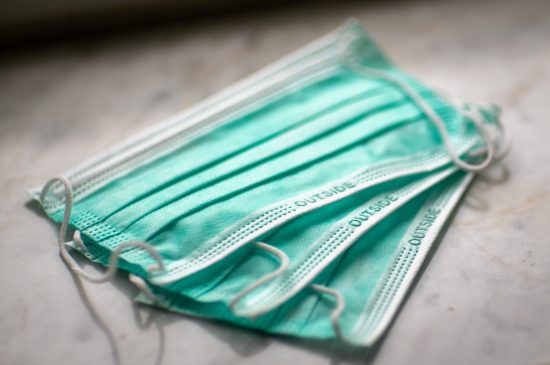 a stack of three face masks