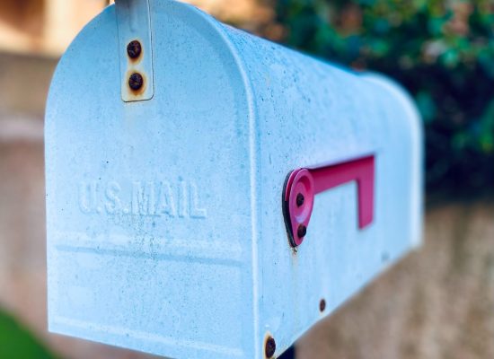 closed mailbox that says, "U.S.. Mail" on the front